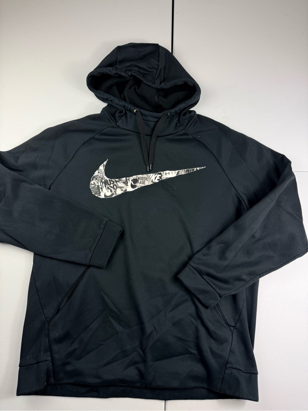 Nike mens Black Hoodie with White Patterned Swoosh